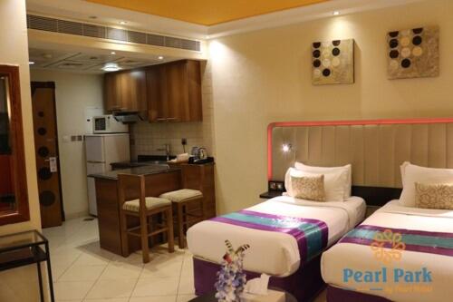 Deluxe Twin Room at Pearl Executive Hotel Apartments, photo 5