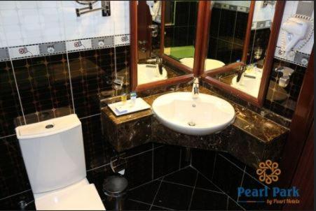 Deluxe Twin Room at Pearl Executive Hotel Apartments, photo 3